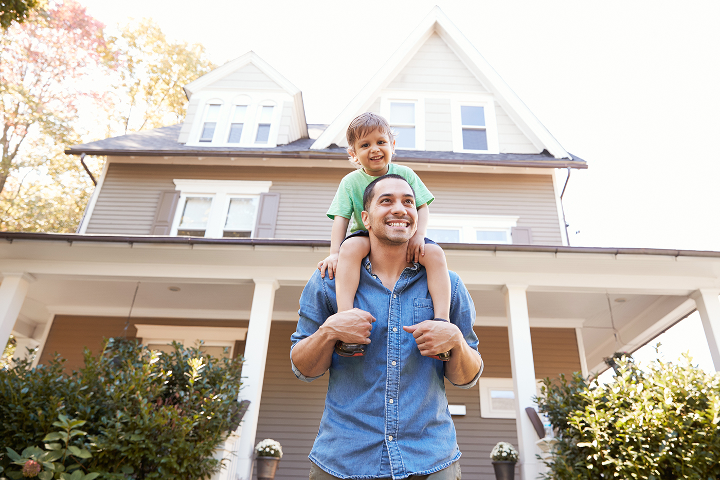 Family in front of house